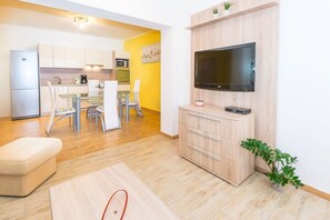 Apartment (N4) | Living area | Flat-screen TV