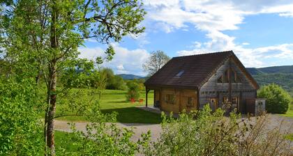 Secluded chalet in the sun with breathtaking views of a wooded valley