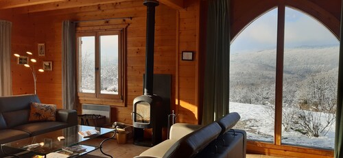 Secluded chalet in the sun with breathtaking views of a wooded valley  