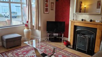 Flat-screen TV, fireplace