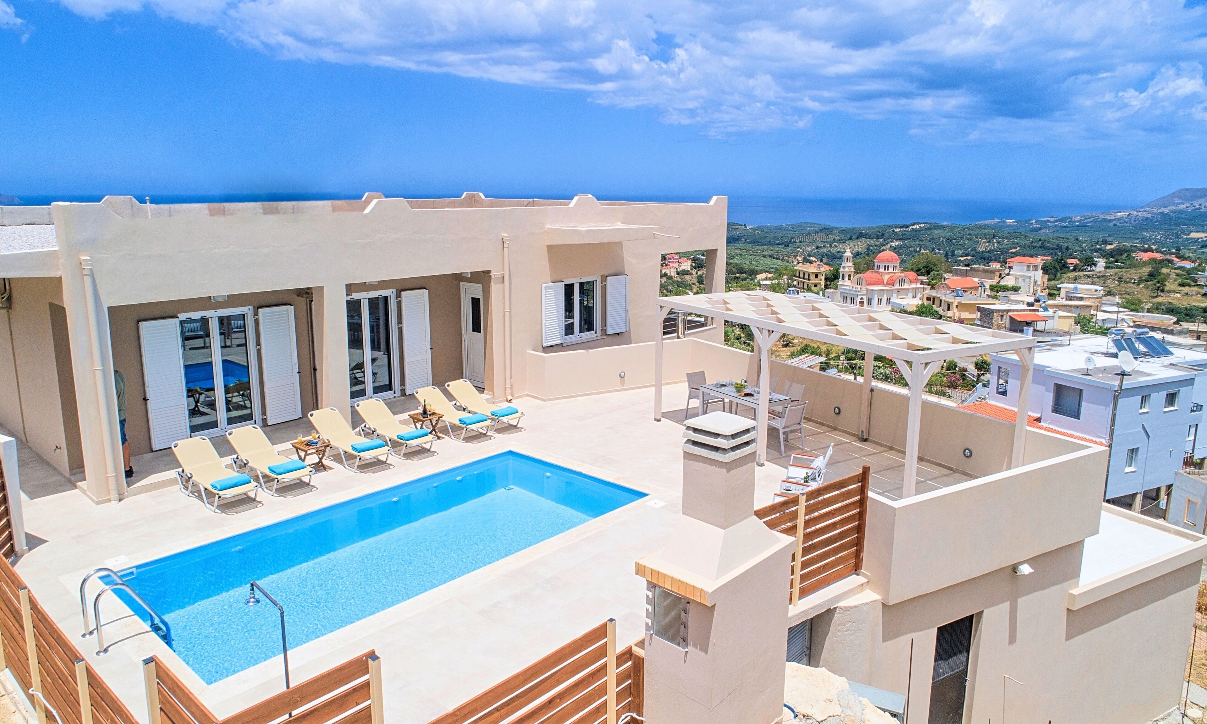 Outdoor pool, a heated pool, sun loungers