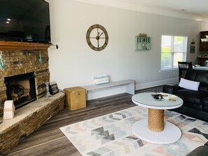 Smart TV, fireplace, books
