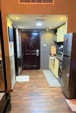 Fridge, microwave, stovetop, coffee/tea maker - Corniche Heartland Luxury Studio with Bach & Sea View (Ajman)
