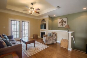 Condo, 1 King Bed with Sofa bed, Private Pool | Living room | 42-inch TV with cable channels, fireplace - Legacy Villa 2004 (Gulfport)