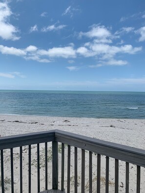 On the beach, sun-loungers