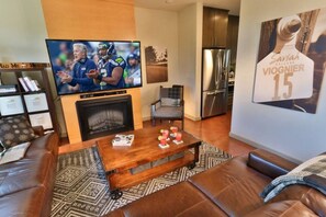 TV, fireplace, books, stereo