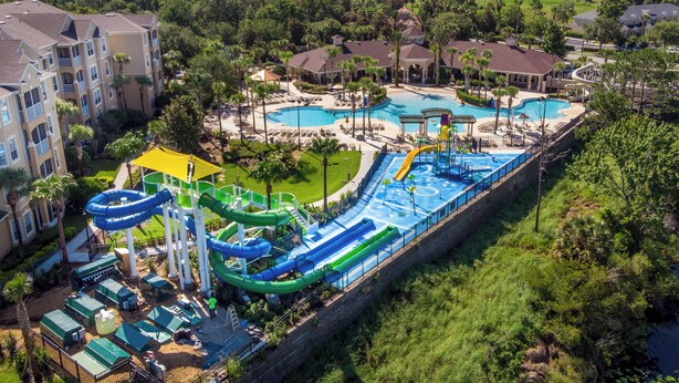 A resort with multiple swimming pools, a water park, and a variety of accommodations.