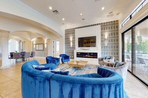 TV, fireplace, video game console, table football