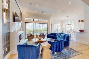 TV, fireplace, video game console, table football