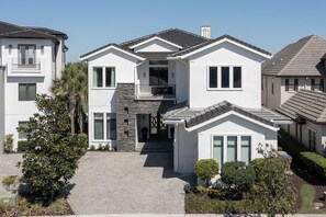 Exterior - Sun-Filled Haven with Sports Themed Game Room at Reunion (Reunion)