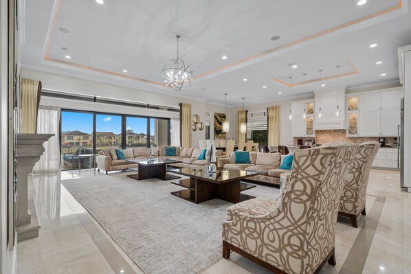 TV, video game console, table football, stereo - Sun-Filled Haven with Sports Themed Game Room at Reunion (Reunion)