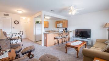 Condo, 1 Queen Bed with Sofa bed, Private Pool | Living room | 42-inch TV with cable channels, DVD player