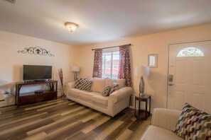 Condo, 1 King Bed with Sofa bed, Private Pool | Living room | 42-inch TV with cable channels