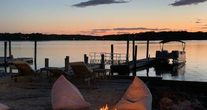 Bay front Hamptons home with direct sunsets and private dock with pontoon boat