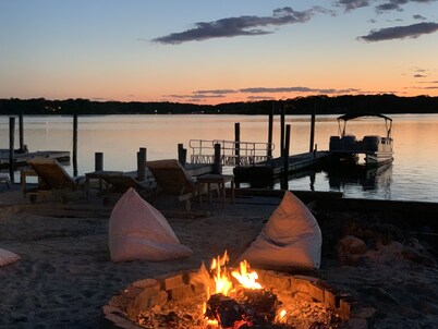 Bay front Hamptons home with direct sunsets and private dock with pontoon boat