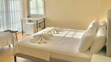 Standard Triple Room | Minibar, laptop workspace, soundproofing, free cots/infant beds