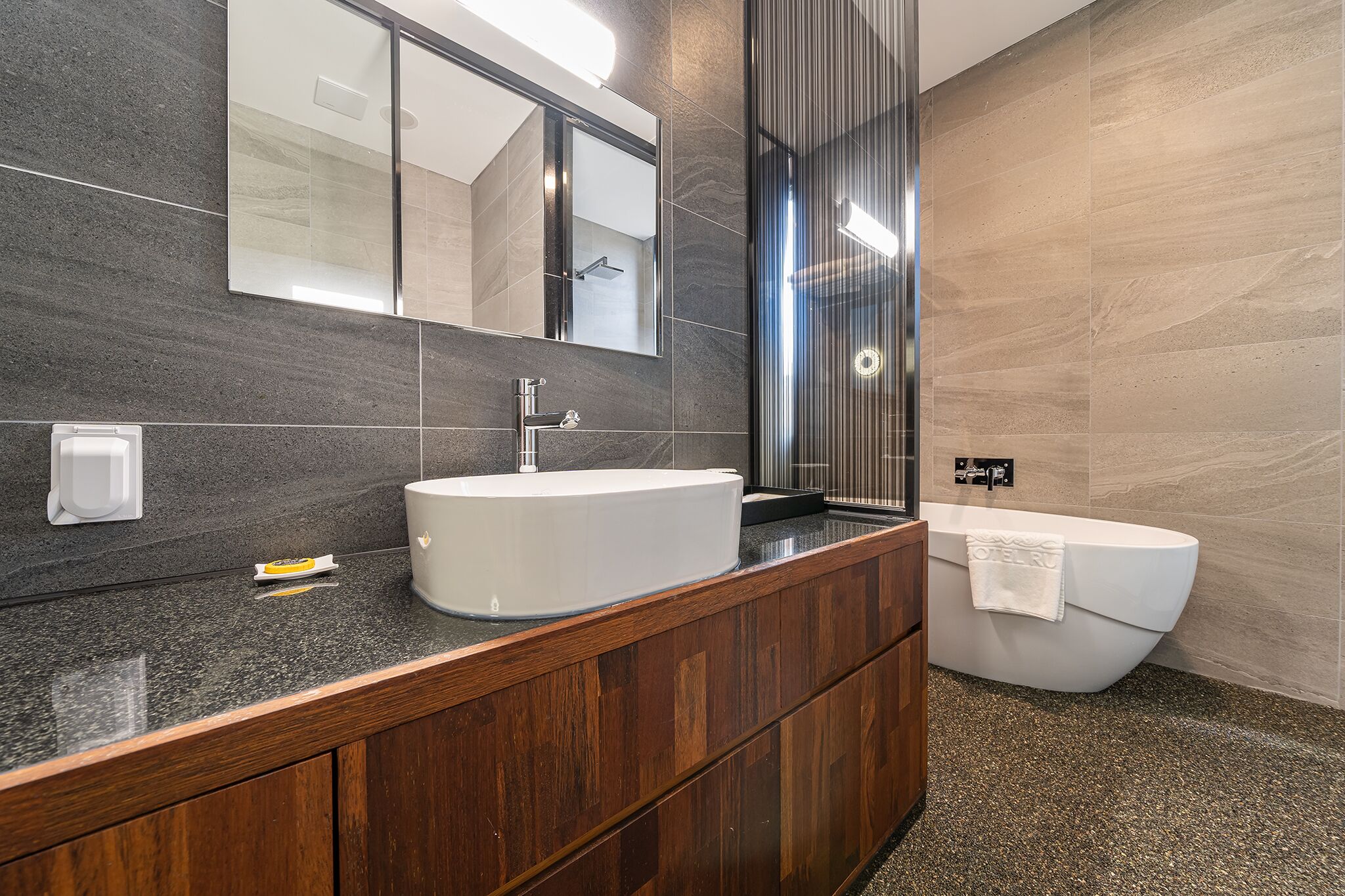 deluxe double room | bathroom | separate bathtub and shower, free toiletries, hair dryer, bathrobes