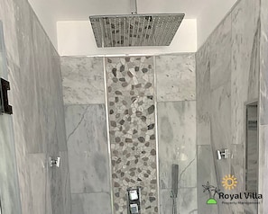 Combined shower/tub, hair dryer, towels, soap