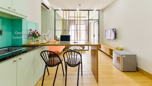 Grand Double Room | Living area | TV - AHA Siga Serviced Apartment (Ho Chi Minh City)