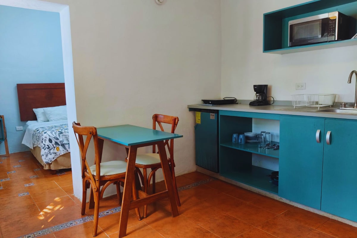 Superior Room | Private kitchen | Coffee/tea maker, mini-fridge, microwave, cleaning supplies