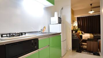 Apartment | Private kitchen | Fridge, microwave, cookware/dishes/utensils