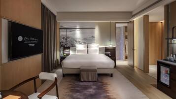 Premium bedding, down duvets, pillow-top beds, minibar