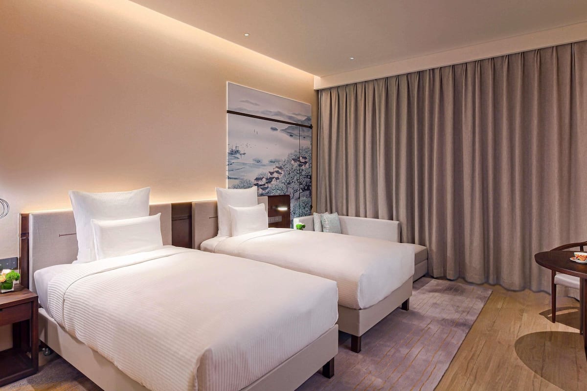 Premium bedding, down duvets, pillow-top beds, minibar