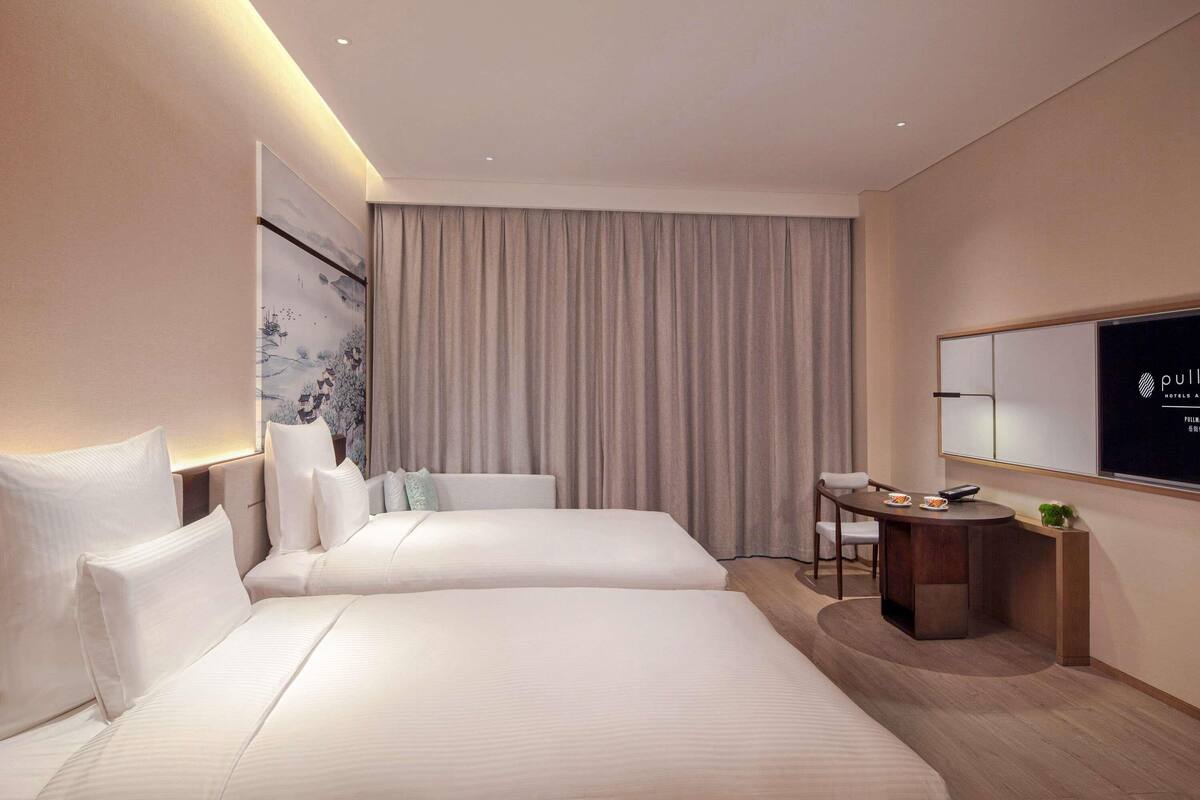 Premium bedding, down duvets, pillow-top beds, minibar