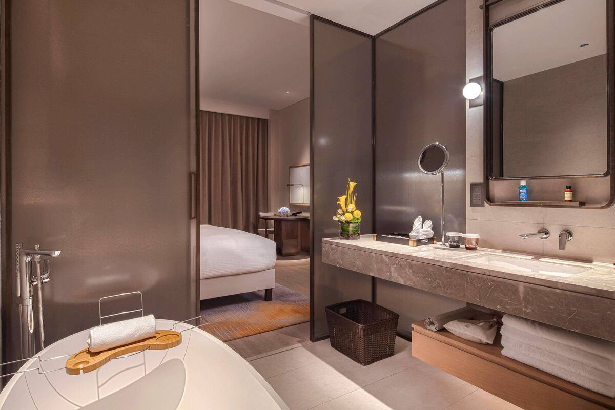 Premium bedding, down comforters, pillowtop beds, minibar