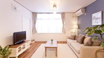 House | Living room | 32-inch TV with digital channels, DVD player
