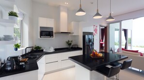 Fridge, microwave, coffee/tea maker, electric kettle