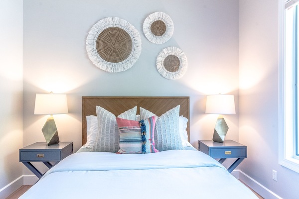 "Beachy Boho Bedroom" Queen sized bed with great lighting for a late night book