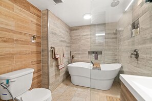 Bathtub, hair dryer, bidet, towels