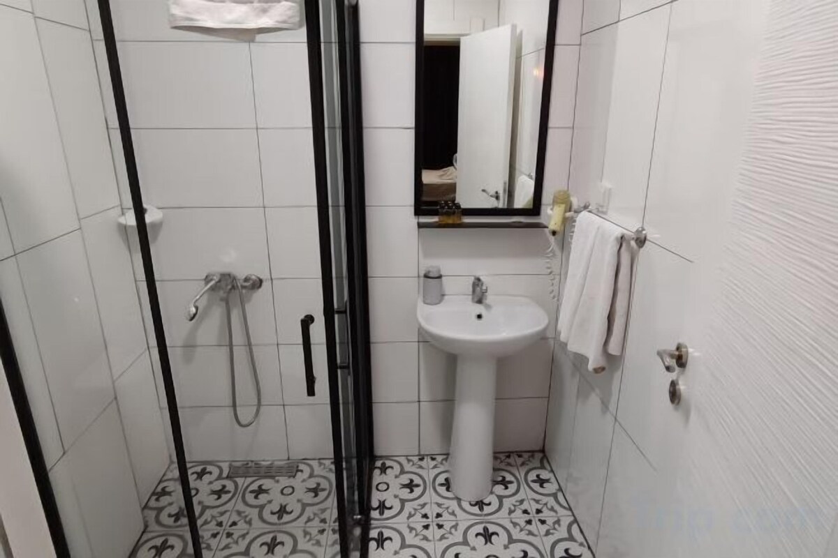 Shower, hydromassage showerhead, designer toiletries, hair dryer