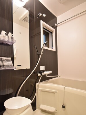 Apartment (103) | Bathroom | Separate bathtub and shower, deep-soaking bathtub, hair dryer, towels