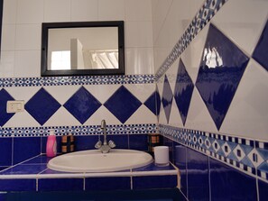 Bathtub, hair dryer, towels