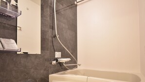 Apartment (104) | Bathroom | Separate bathtub and shower, deep-soaking bathtub, free toiletries - Alphabed Okayama Sennitimae104 (Okayama)