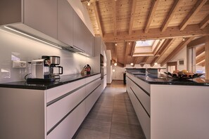 Fridge, microwave, dishwasher, coffee/tea maker