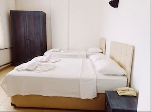 Habitación cuádruple clásica | Cunas gratuitas y wifi gratis 