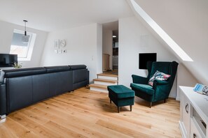 Smart TV, fireplace, books