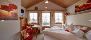 ルーム (Cosy, radiating a sense of well-being) | ベビーベッド (無料)、WiFi (無料)、ベッドシーツ