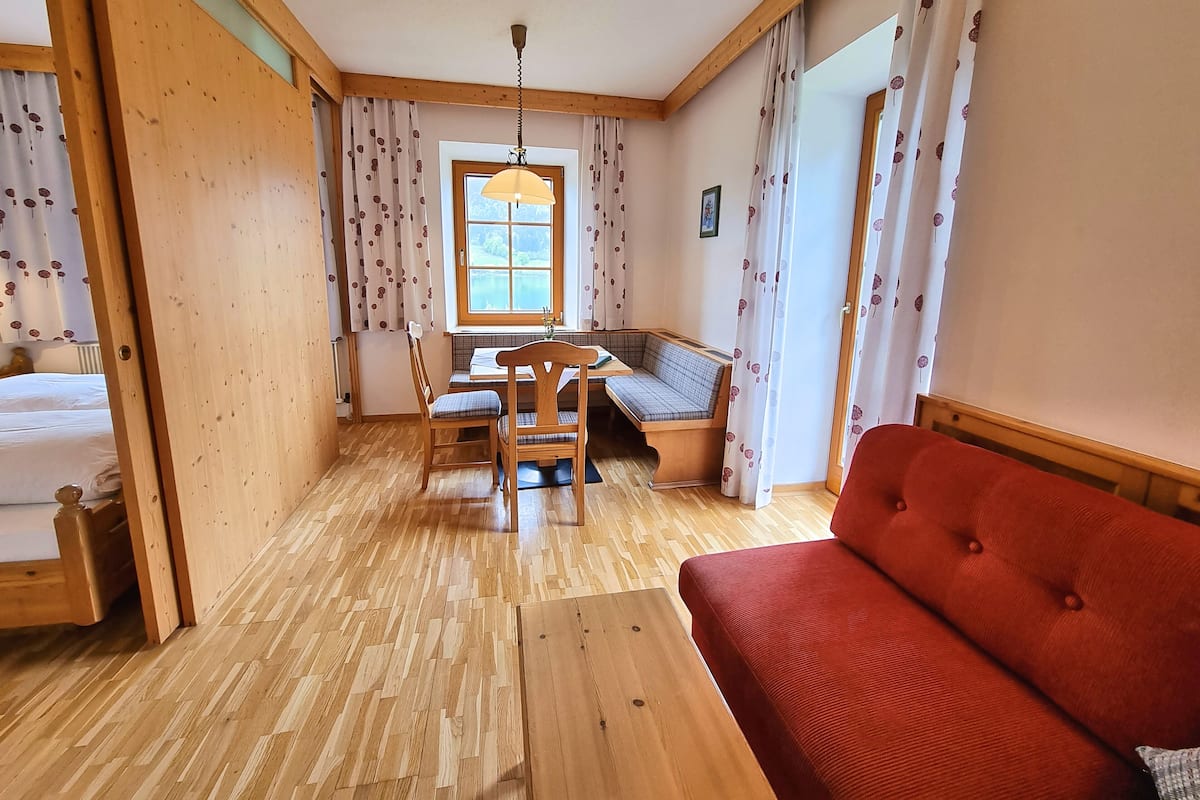 Apartment, 2 Bedrooms, Balcony, Lake View (incl. Cleaning fee) | Living area | 35-inch Smart TV with satellite channels, TV, toys