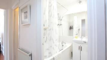 Hair dryer, towels, soap, shampoo