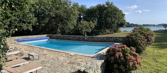 Waterfront manor house with heated pool