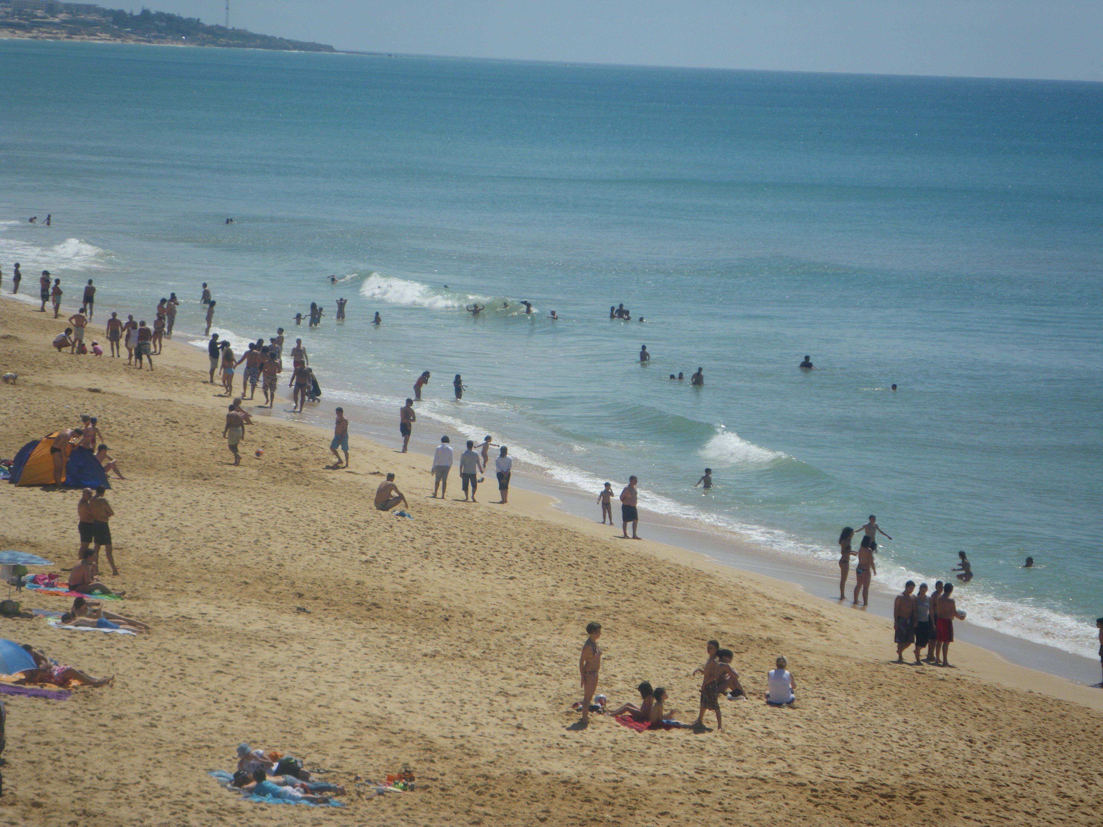 On the beach, beach towels