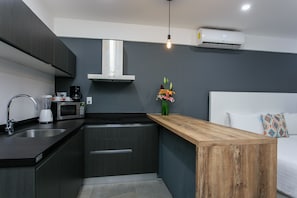 Fridge, microwave, coffee/tea maker, toaster