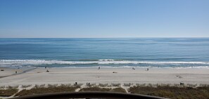 On the beach, sun loungers