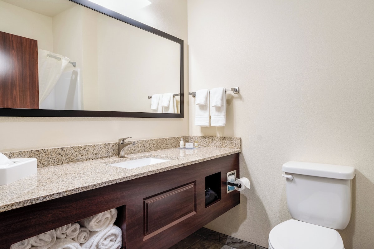 combined shower/bathtub, hair dryer, towels, soap