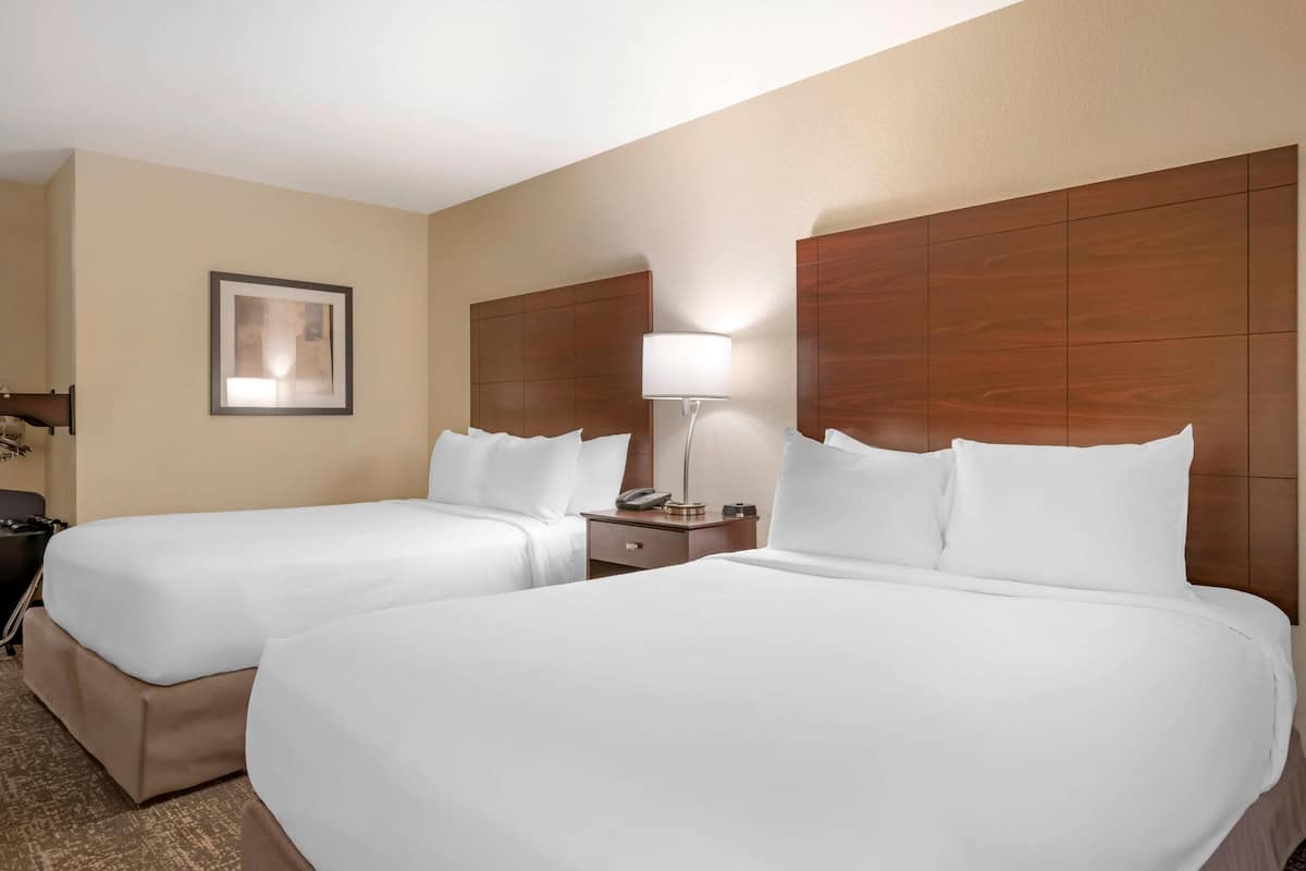 Down duvets, pillow-top beds, in-room safe, blackout curtains