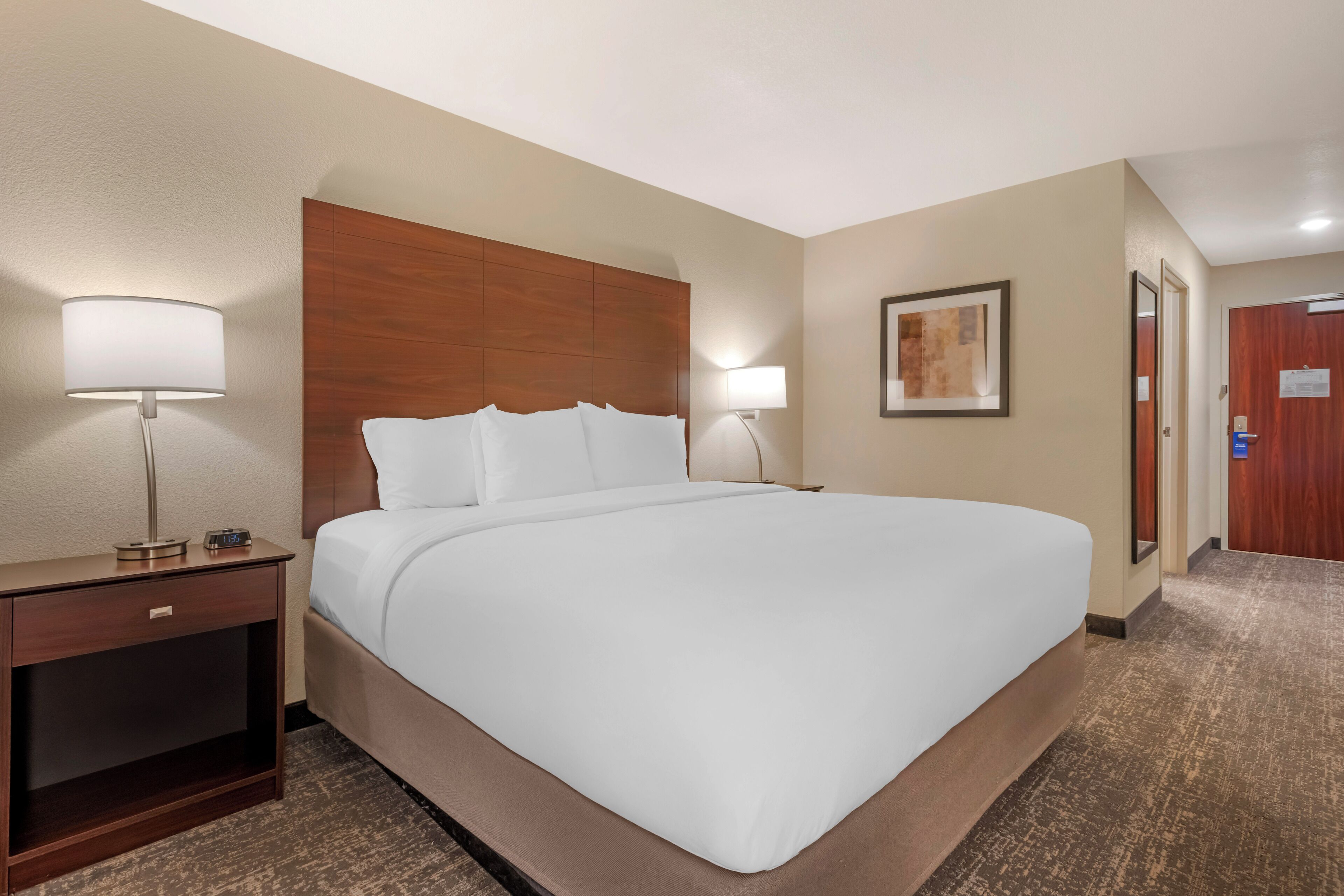 Down comforters, pillowtop beds, in-room safe, blackout drapes